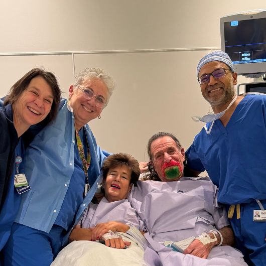 John Zisa and Cynthia DePalma with their kidney surgery care team.