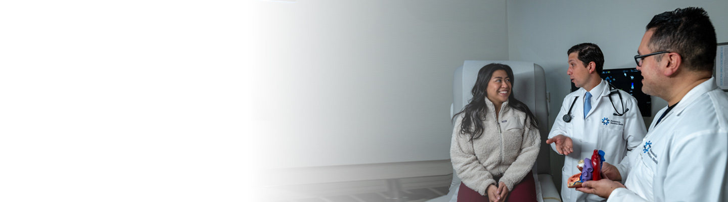 Doctors discussing heart care with patient