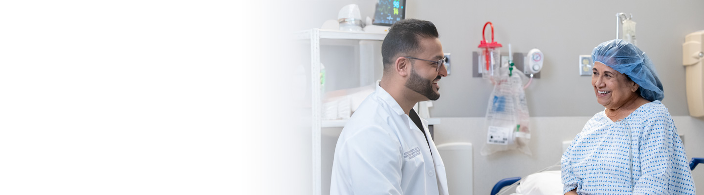 Orthopedic surgeon speaking with patient