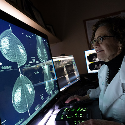 Dr. Borofsky reviewing mammogram scans