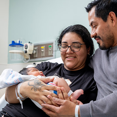 baby alejandro aguirre with parents