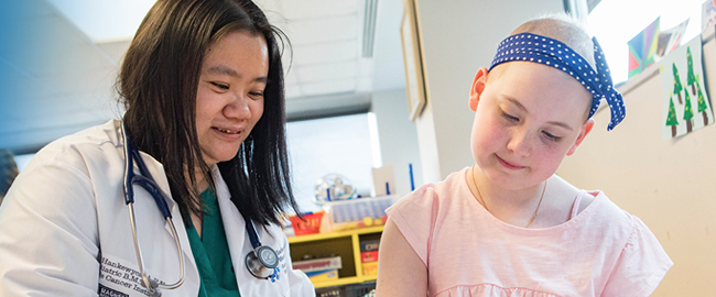 Female Doctor with Juvenile Patient Female Doctor with Juvenile Patient