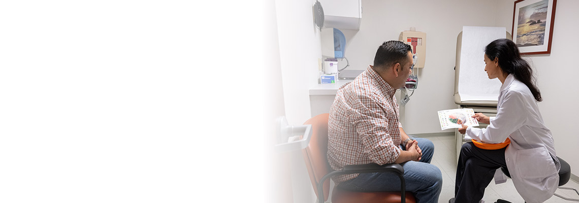 dietician discussing healthy eating with patient in medical office