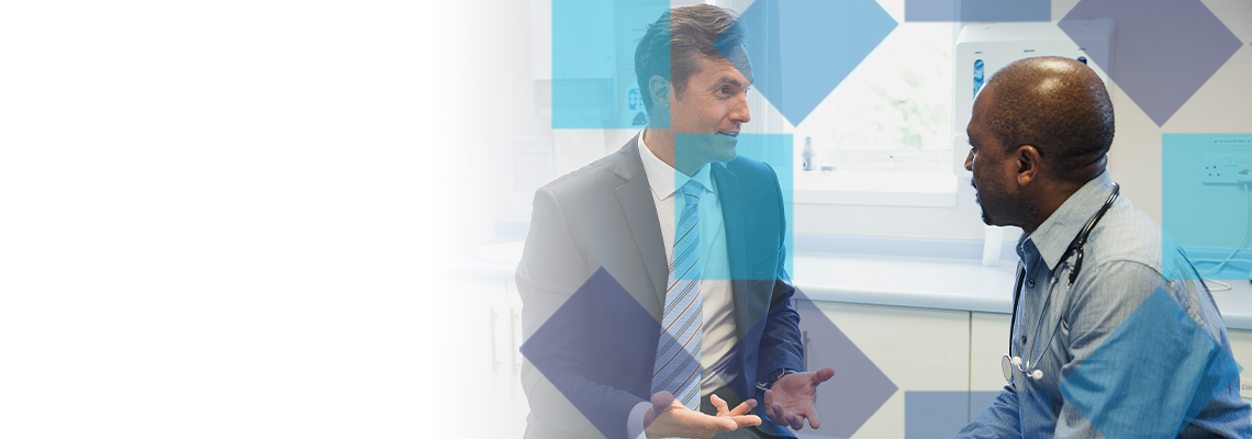 Business man Talking to the Doctor Image- New-Executive-Health-Program-banner