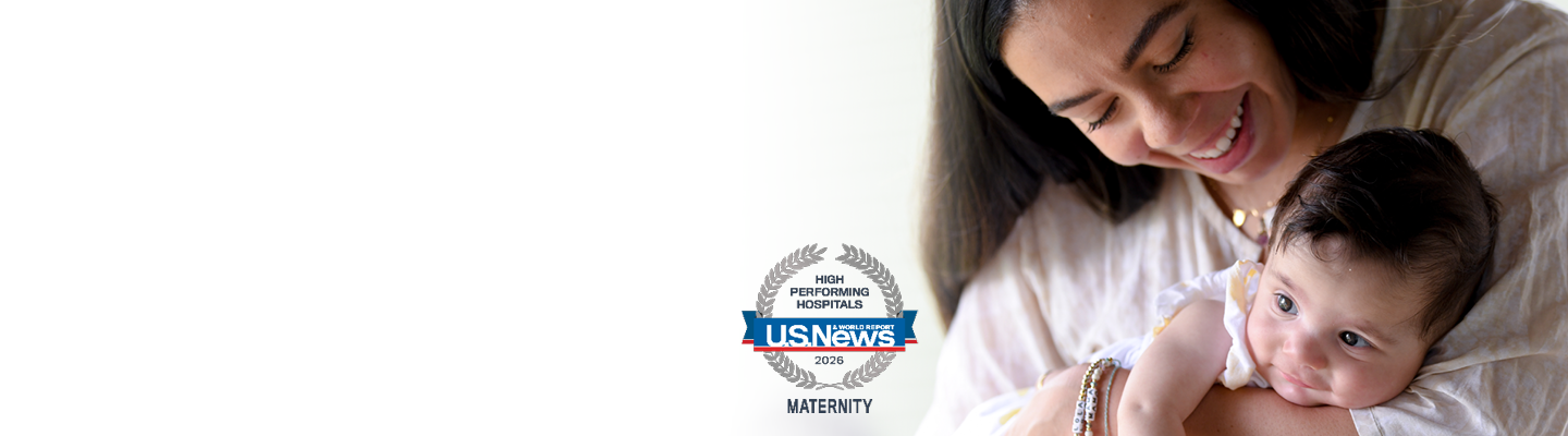 Mother smiling and holding an infant with text NJ's Most Recognized Hospital System for Maternity Care