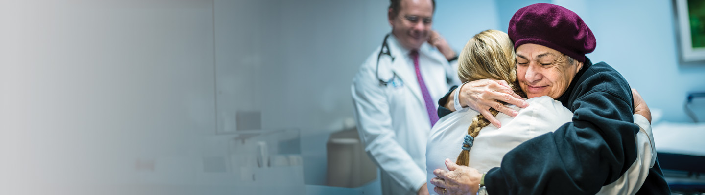 patient hugging doctor