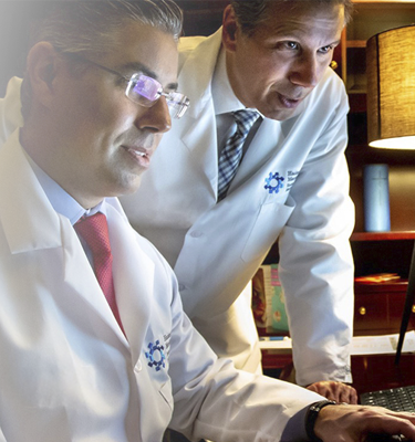 Two doctors reviewing imaging