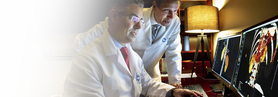 Two doctors reviewing imaging