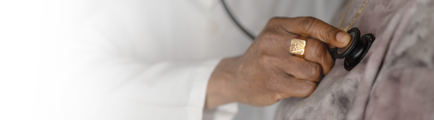 Doctor checking patients' lungs