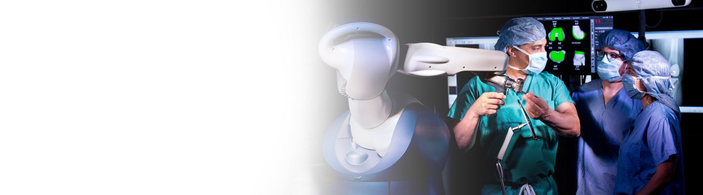 Robotic orthopedic surgery team in operating room