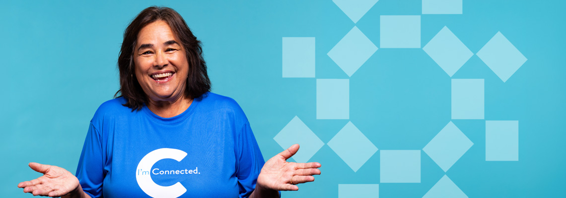 Woman smiling wearing connected shirt
