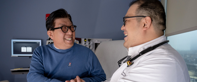 physician and patient talking