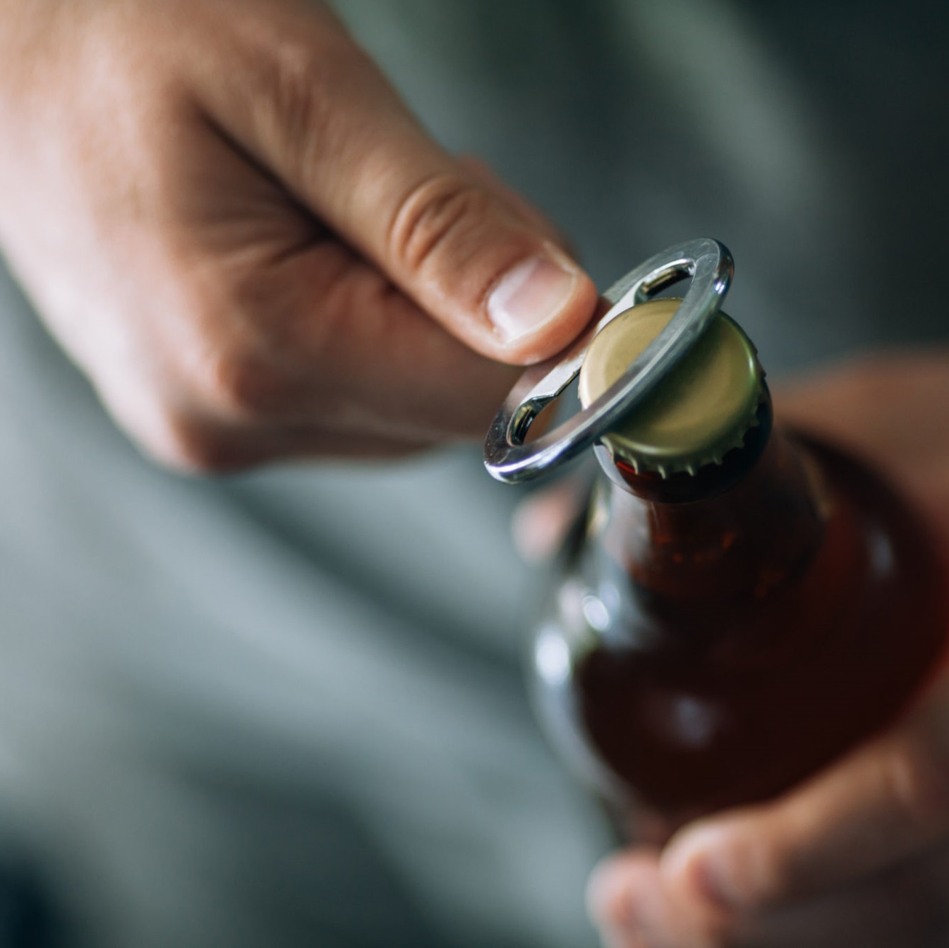 opening a bottle of alcohol