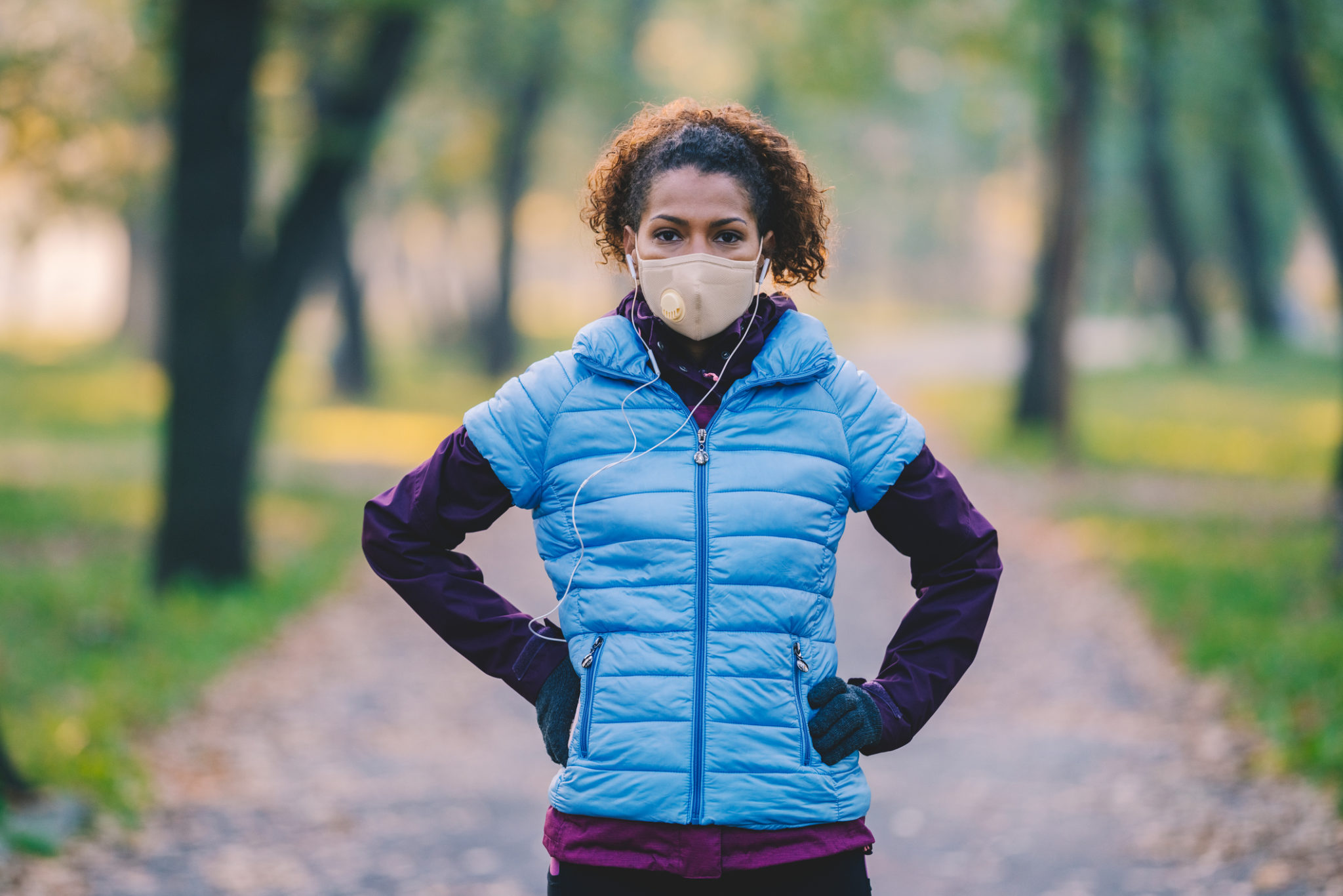 Woman walking in mask