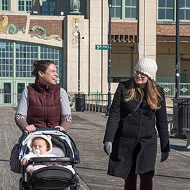 Healthy trends women walking with babies on boardwalk