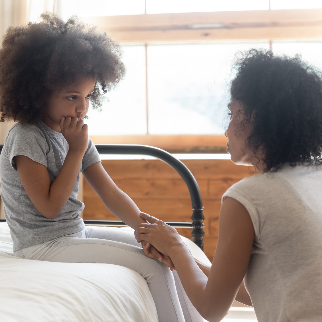 Mom talking with child