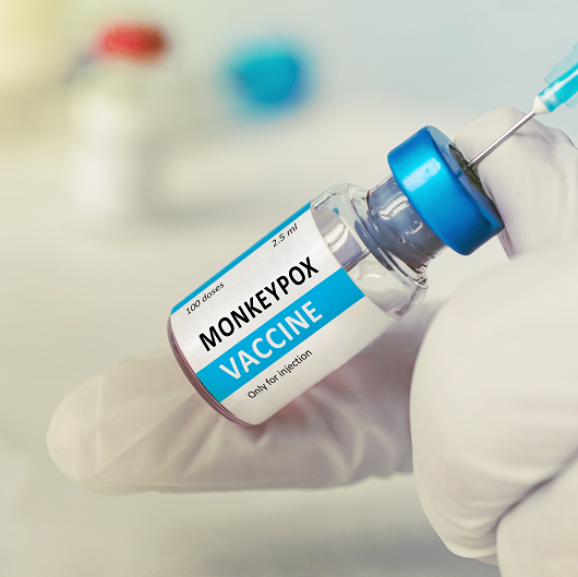 Doctor with vial of vaccine for Monkeypox disease.