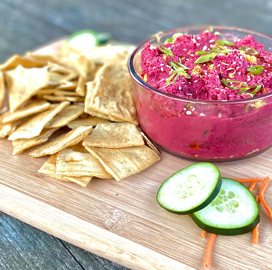 Pink colored beet hummus for breast cancer awareness month