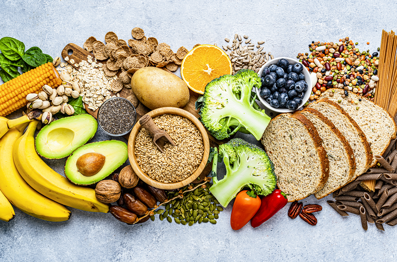 Overhead view of a large group of food with high content of dietary fiber arranged side by side