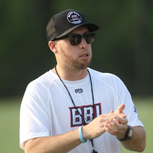Standing outside, 28-year-old James Harabedian claps his hands. Photo credit: Action Shooters