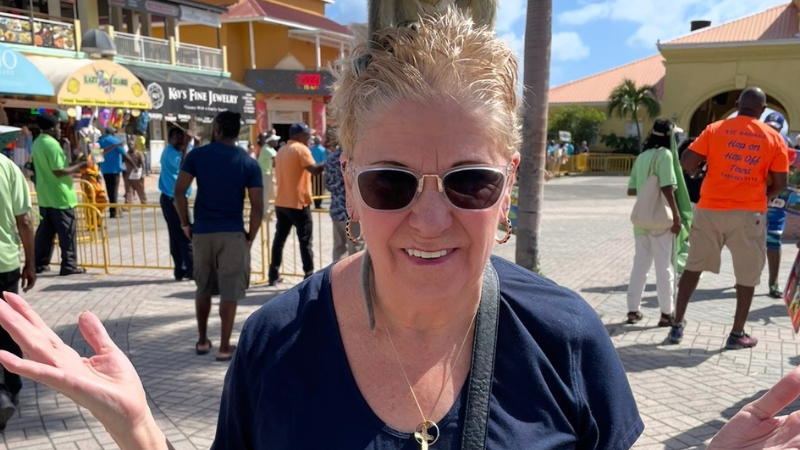 While on a vacation, Loisanne Diehl poses with a monkey on her head.
