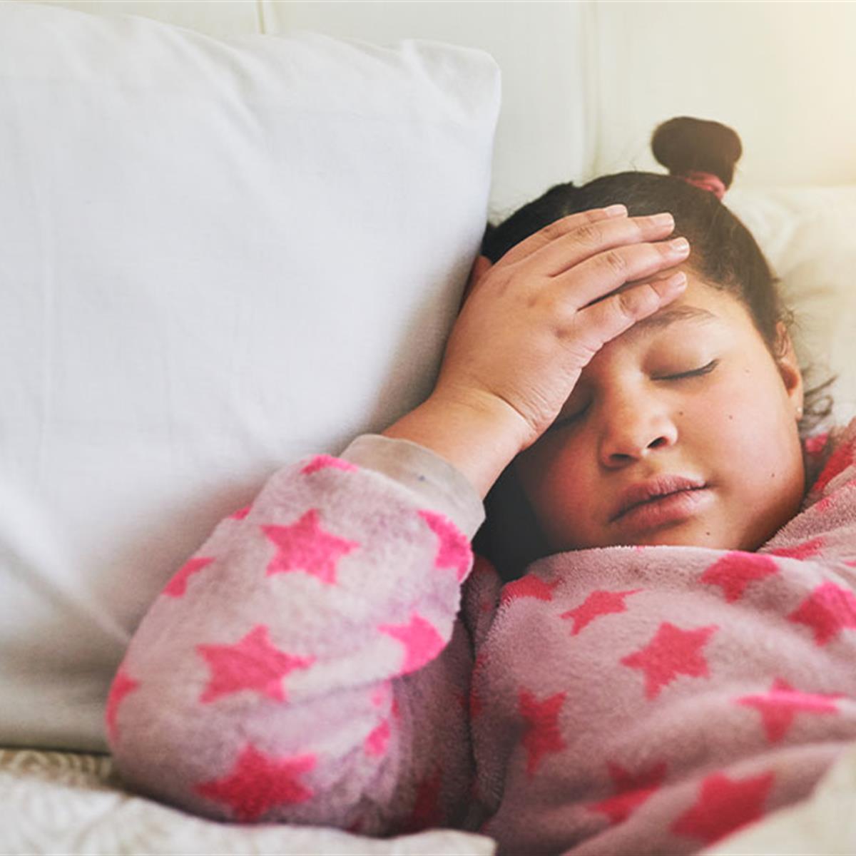 Kid with hand on forehead