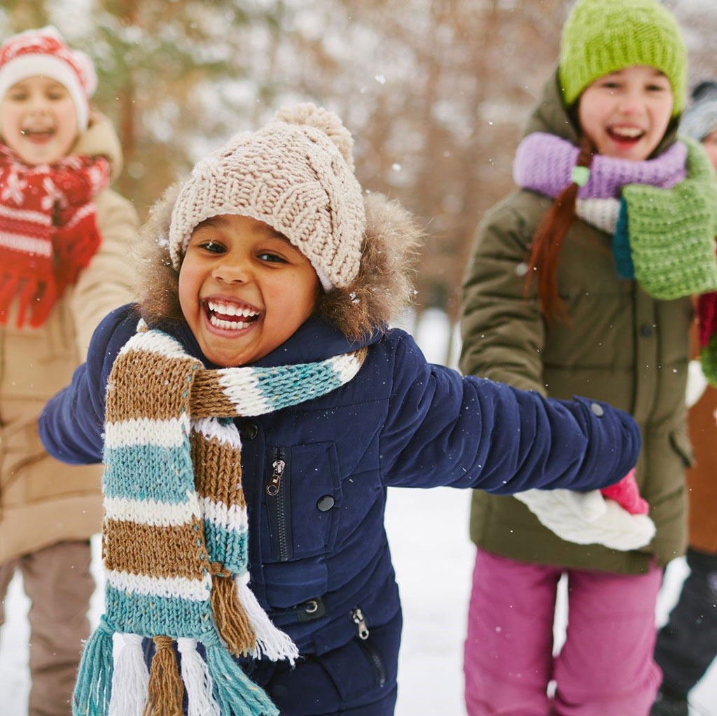 Young Children Playing in Snow