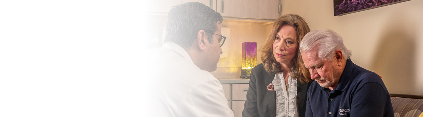 Hospice caregiver meeting with patient