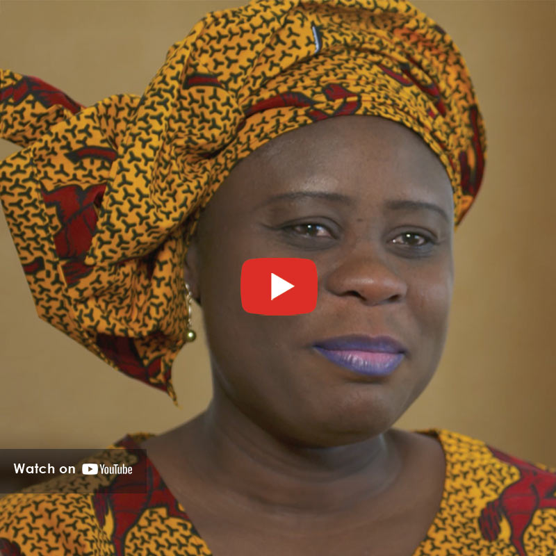 Afro American Women wearing yellow headress
