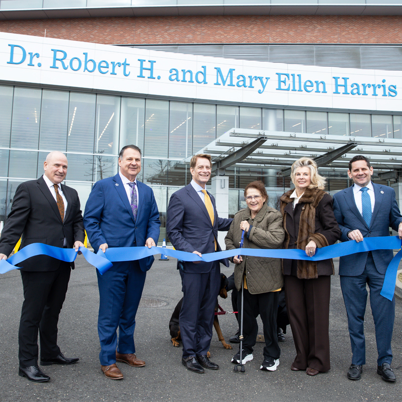 Executives standing in front of JSUMC Hope Tower