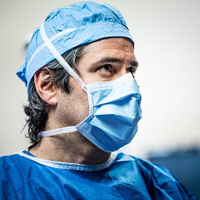 physician with mask on - close-up