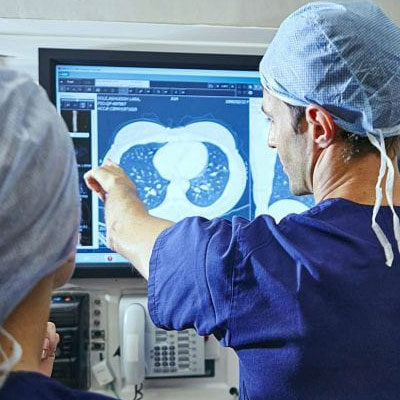 two providers looking at an x-ray