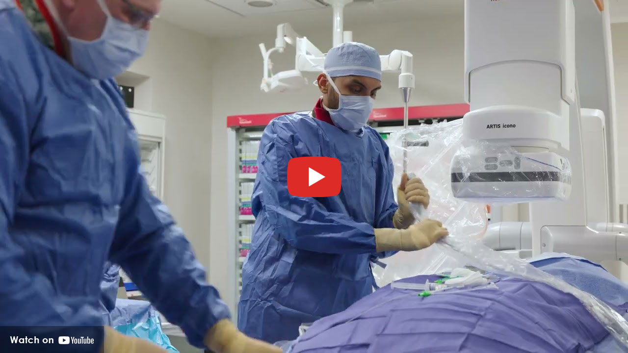 two doctors performing surgery