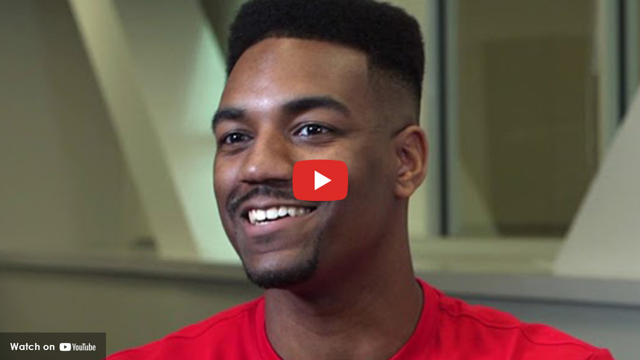 Organ transplant recipient smiling at camera