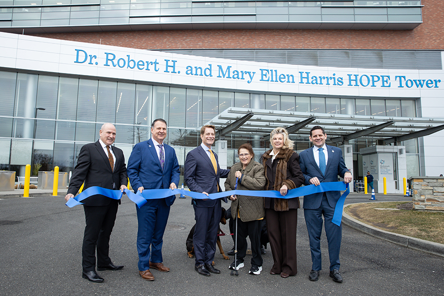 Executives standing in front of JSUMC Hope Tower