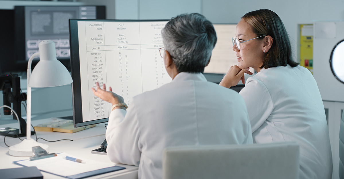 medical professionals at computer