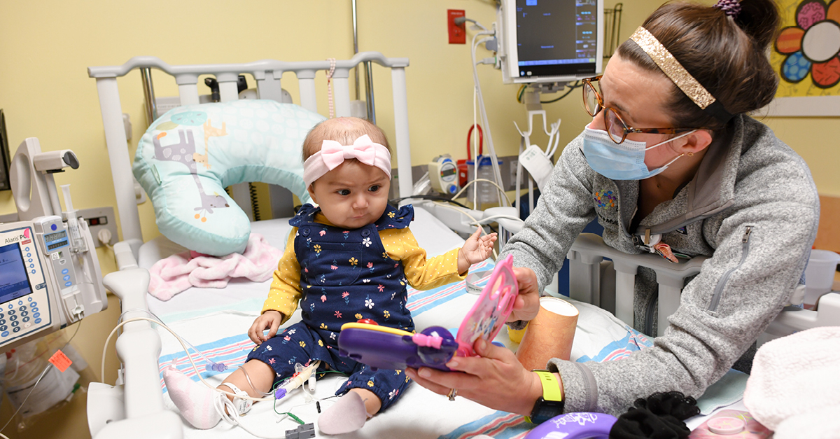 Baby with medical professional